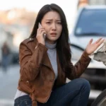 miserable-woman-crying-while-calling-help-mobile-phone-after-car-accident